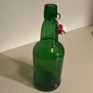 Green glass bottle with flip top closer 25.4 oz